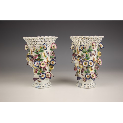 814 - A pair of Bow porcelain frill vases, 18th century, each of flared cylindrical form, the pierced rim ... 