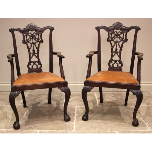 1012 - A set of eight mahogany Chippendale style dining chairs, early 20th century, each with a ribbon tied... 