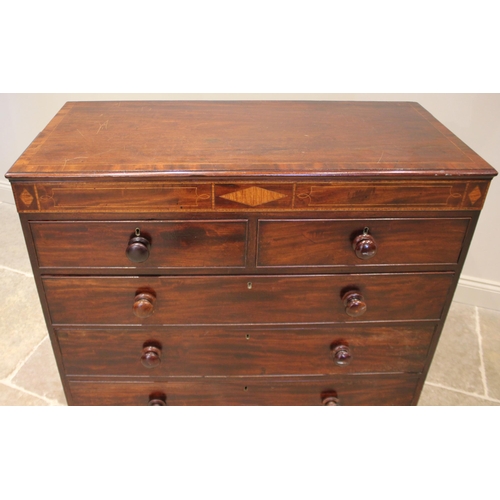 1024 - An early 19th century mahogany chest of drawers, the moulded and crossbanded top over an inlaid frie... 