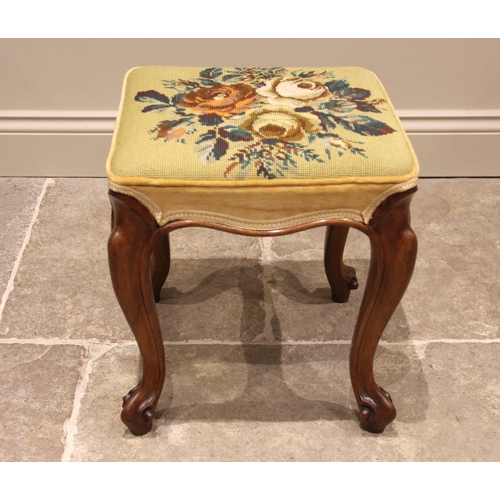 1060 - An upholstered mahogany dressing stool, early 20th century, the square tapestry seat upon French cab... 