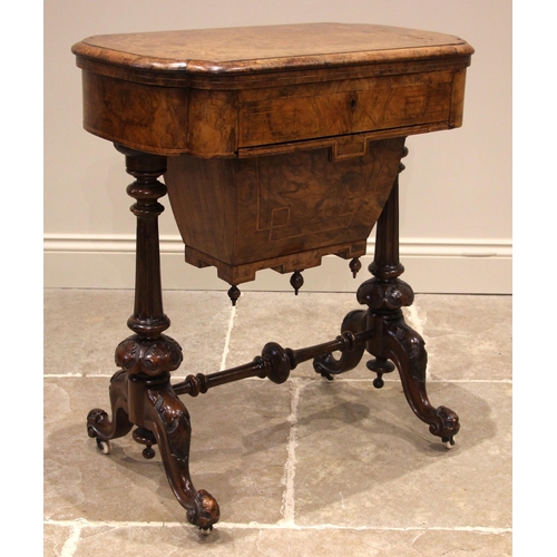 1062 - A Victorian burr walnut games/work table, the quarter veneered and marquetry inlaid hinged top, open... 