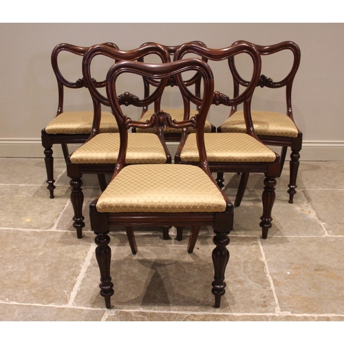 1065 - A matched set of six Victorian mahogany dining chairs, each chair with a compressed balloon back ove... 