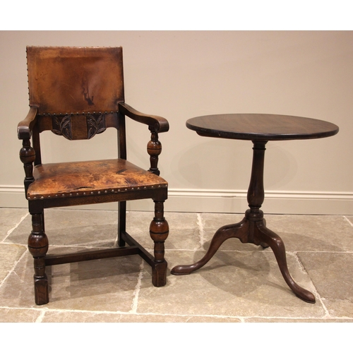 1068 - A 17th style oak elbow chair, early 20th century, the leather back rest with peripheral stud detail ... 