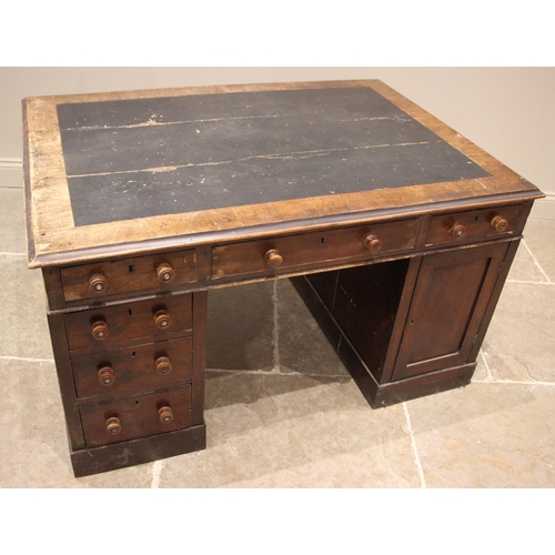 1071 - A Victorian mahogany twin pedestal partners' desk, the rectangular moulded top with inset skiver, ov... 