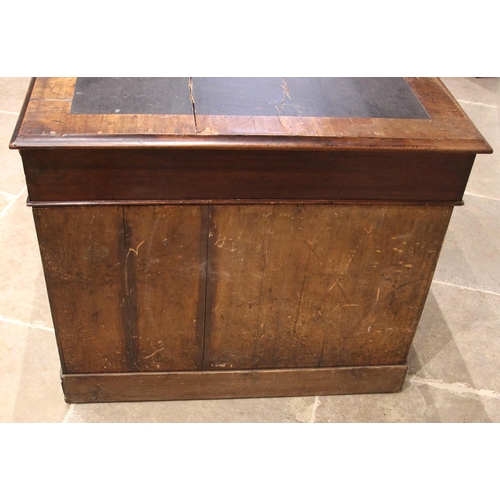 1071 - A Victorian mahogany twin pedestal partners' desk, the rectangular moulded top with inset skiver, ov... 