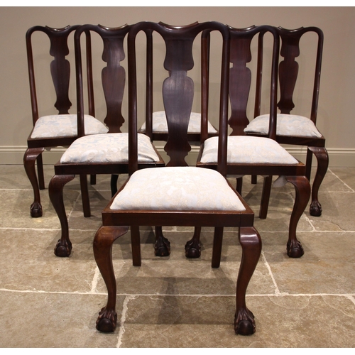 1074 - A set of eight mahogany Queen Anne style dining chairs, early 20th century, each chair with a vase s... 