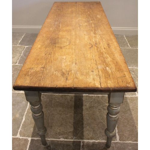 1080 - A Victorian painted pine kitchen/scullery table, the slab scrub top upon a painted frieze and turned... 