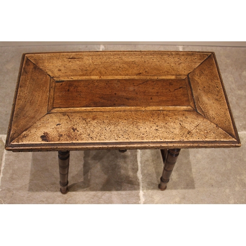 1081 - A 19th century walnut occasional table, the associated over-sailing top with a dentil frieze above a... 