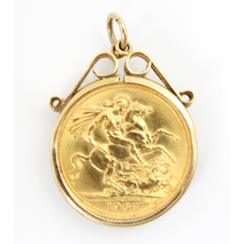 138 - A full sovereign, dated 1967, within a 9ct yellow gold pendant mount, of plain polished form with sc... 