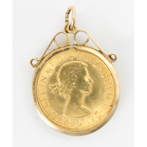 138 - A full sovereign, dated 1967, within a 9ct yellow gold pendant mount, of plain polished form with sc... 