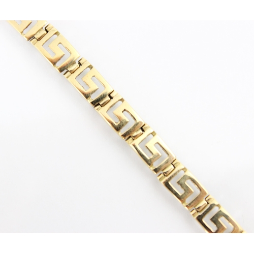 254 - A yellow metal bracelet, the openwork bracelet designed as Greek key with box and tongue fastening, ... 