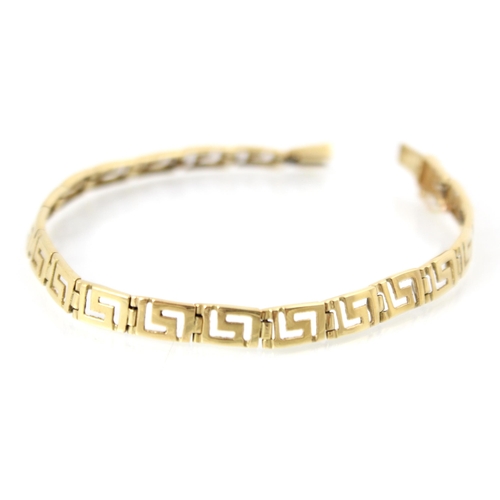 254 - A yellow metal bracelet, the openwork bracelet designed as Greek key with box and tongue fastening, ... 