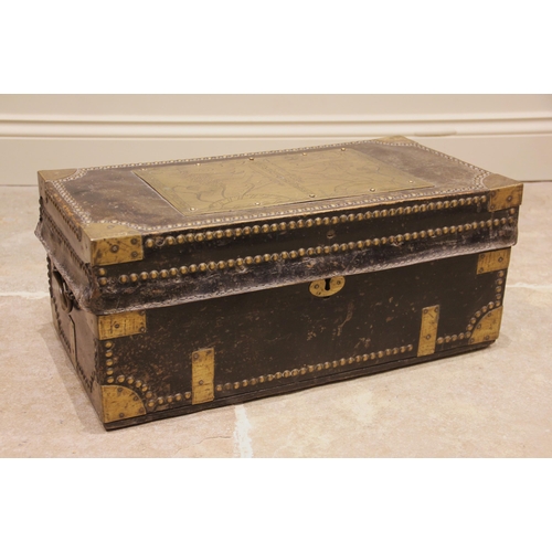 377 - An 18th century camphorwood leather bound and brass studded trunk, the hinged cover applied with a b... 