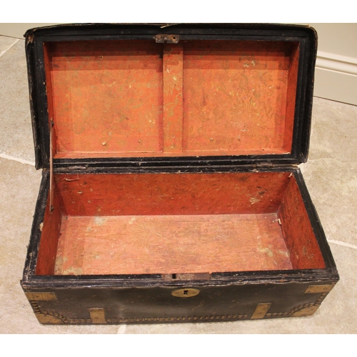 377 - An 18th century camphorwood leather bound and brass studded trunk, the hinged cover applied with a b... 