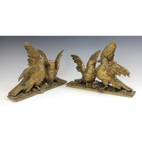 388 - Two pairs of carved giltwood and gesso doves, 19th century, each modelled billing and cooing, each 2... 