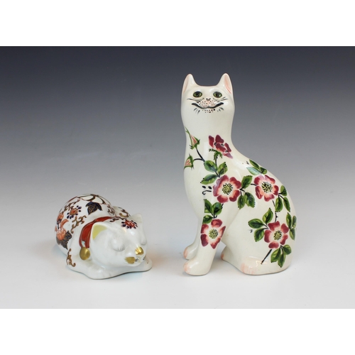 603 - A Griselda Hill Pottery Wemyss cat, 21st century, decorated with floral and foliate design, painted ... 