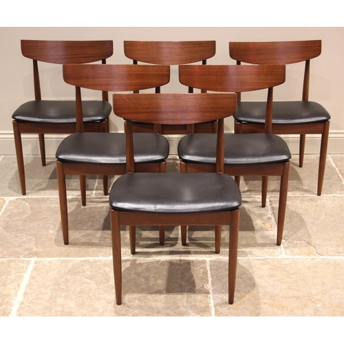 624 - E Gomme for G-Plan, six teak dining chairs and table, mid 20th century, the chairs with a concave ba... 