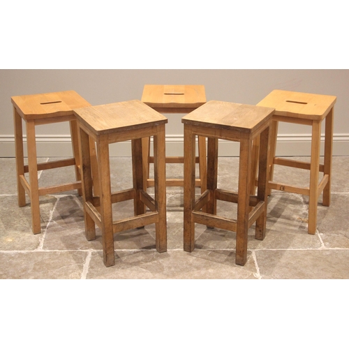 640 - A trio of beech wood bar stools, by Remploy, mid to late 20th century, each with a shaped seat upon ... 