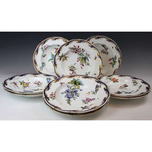 665 - Nine Coalport soup plates, mid 19th century, the blanks from moulds produced by Sevres, each piece p... 