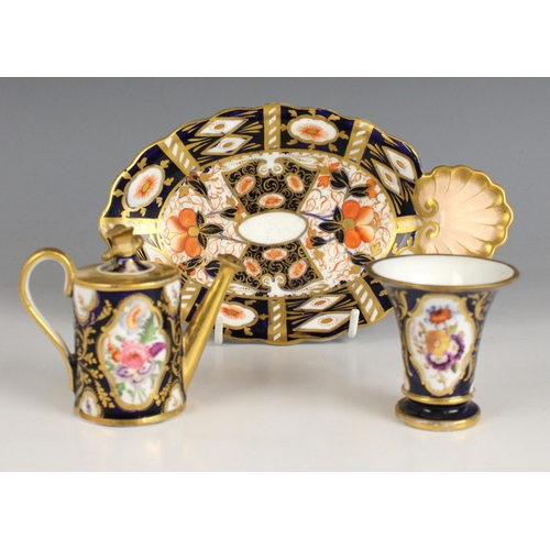 677 - A Davenport miniature watering can and cover, circa 1825, decorated with floral reserves set among g... 