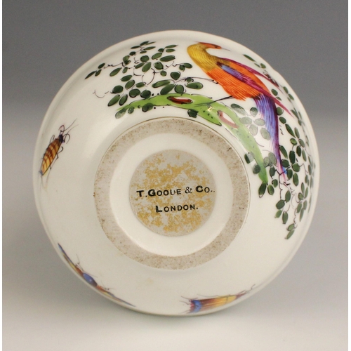 690 - A porcelain model of a hyacinth, 20th century, set to a bowl decorated with exotic birds in the mann... 