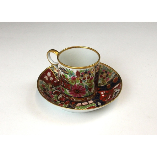 711 - A Royal Crown Derby cup and saucer, late 18th/early 19th century, decorated in the imari palette, pa... 