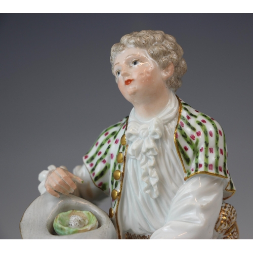 713 - A near pair of German porcelain figures, 19th century, modelled as a shepherdess holding a letter, s... 