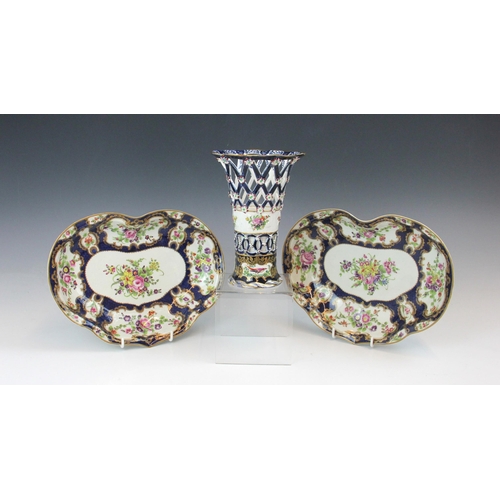 715 - Two Worcester bon bon dishes, 18th century, decorated with floral reserves surrounded by gilt highli... 