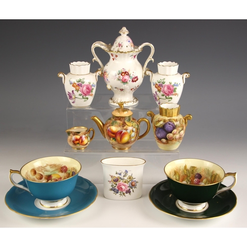 721 - A Royal Worcester Fallen Fruit miniature teapot, with naturalistic ground, floral finial and gilt hi... 