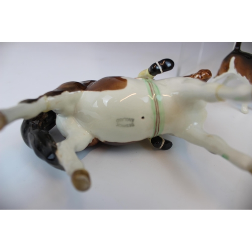 739 - A Beswick figure of 'Girl On Pony', model no. 1499, designed by Arthur Gredington, in the piebald co... 