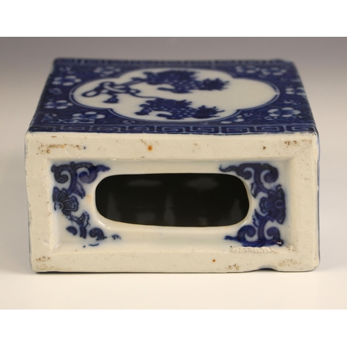 772 - A Chinese porcelain blue and white flower brick, 20th century, of rectangular form with reticulated ... 