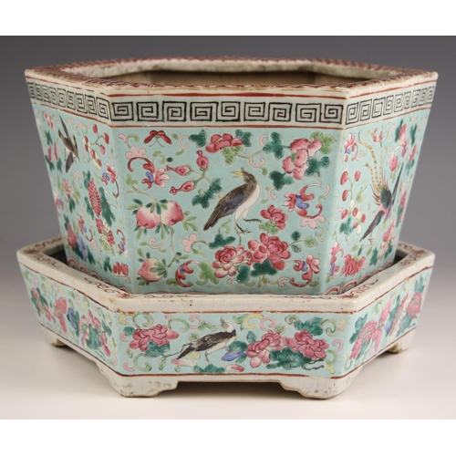 776 - A Chinese porcelain Straits Market jardinière and stand, 19th century, the hexagonal planter externa... 