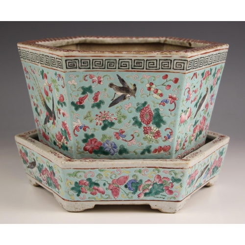 776 - A Chinese porcelain Straits Market jardinière and stand, 19th century, the hexagonal planter externa... 