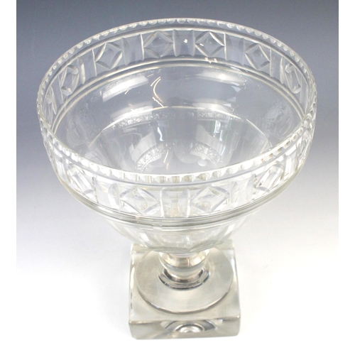 793 - A glass chalice of large proportions, late 19th/ early 20th century, the ogee fluted bowl with cut f... 