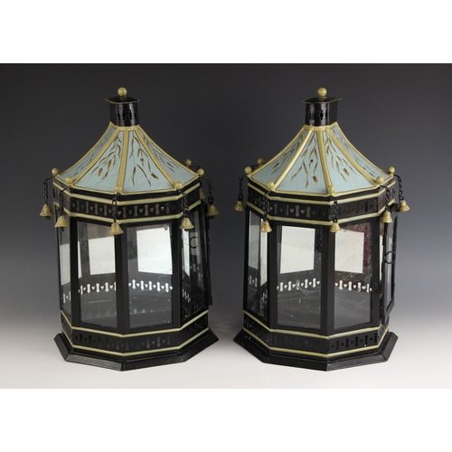 810 - A pair of toleware wall mounting lanterns, 20th century, the pagoda shaped tops suspending bells abo... 