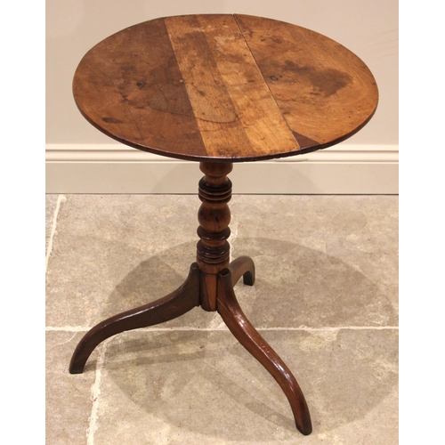 1016 - A George III fruitwood tripod table, the circular top upon a ring turned baluster pedestal, three ta... 