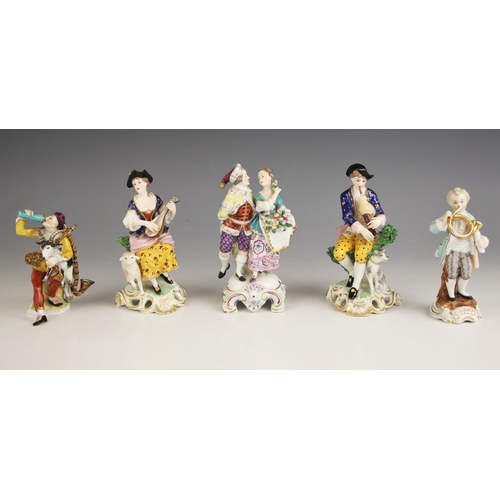 653 - Five continental porcelain figural groups, 19th century and later, comprising: a Volkskedt harlequin... 