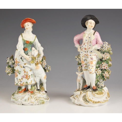 654 - A near pair of Derby porcelain figures of a shepherd and shepherdess, c. 1760-65, the shepherd model... 