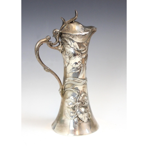 104 - A WMF claret jug, the cast leaf thumbpiece above a shaped rim leading to the tapered body with all o... 