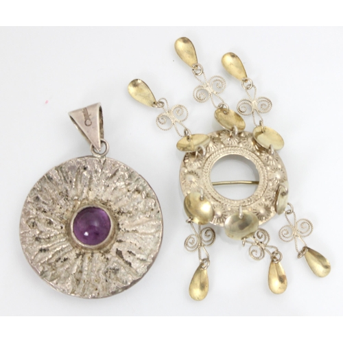 158 - A Pentti Sarpaneva silver pendant, the circular pendant with bark effect detail and central amethyst... 