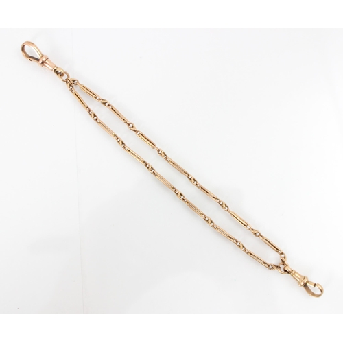 197 - A 9ct yellow gold bracelet, the fancy double link chain with twisted detail, lobster fastener to eac... 