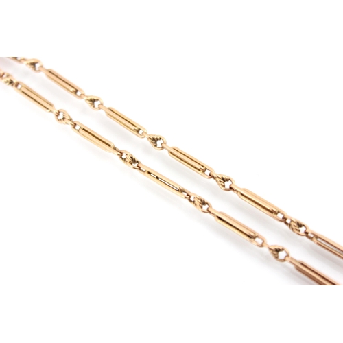 197 - A 9ct yellow gold bracelet, the fancy double link chain with twisted detail, lobster fastener to eac... 