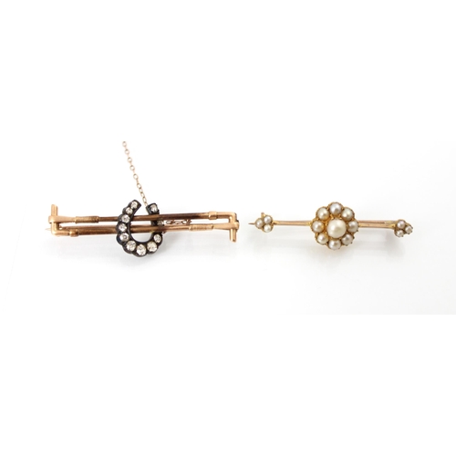 205 - A Victorian style split pearl brooch, the raised central motif designed as a flowerhead with split p... 