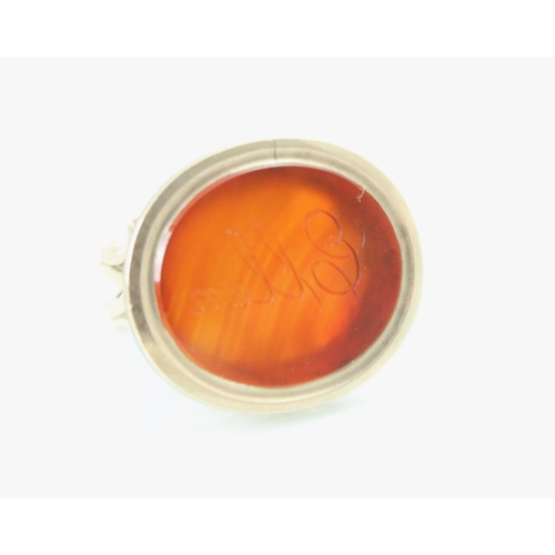 228 - A 20th century carnelian set seal fob, the oval intaglio with engraved 'Ellen' to centre, set within... 