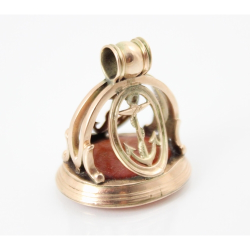 228 - A 20th century carnelian set seal fob, the oval intaglio with engraved 'Ellen' to centre, set within... 