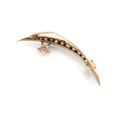 240 - An early 20th century diamond brooch, the crescent shaped brooch set with graduated old cut diamonds... 