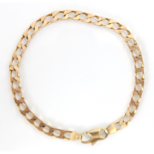 253 - A 9ct yellow gold bracelet, the curb link bracelet with lobster clasp fastening, stamped 'MF' possib... 