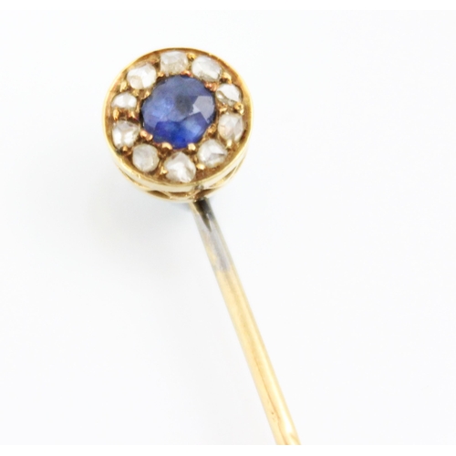 263 - An early 20th century untested sapphire and rose cut diamond stick pin, the central blue stone with ... 