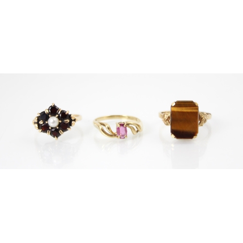 269 - A selection of six rings, to include a diamond cluster ring, within a white metal shank stamped '750... 