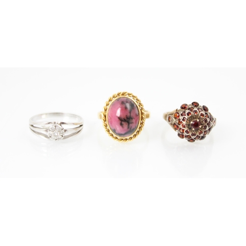 269 - A selection of six rings, to include a diamond cluster ring, within a white metal shank stamped '750... 